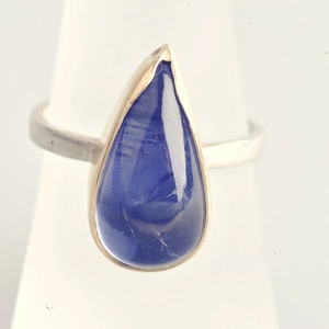 Doris In The Hamptons Pear shaped, teardrop Iolite set in 14 ct gold on a silver band
