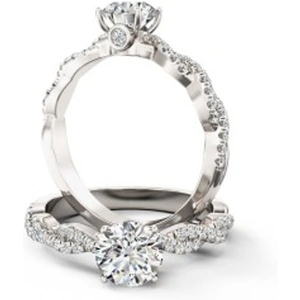 Purely Diamonds A beautiful round brilliant cut diamond ring with shoulder stones in 18ct white gold (In stock)